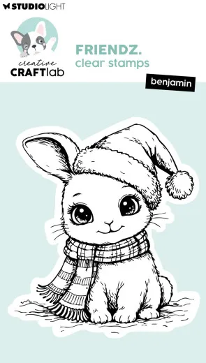 Verpackungsvorderseite mit unkoloriertem Clear-Stamp-Motiv des Hasen Benjamin mit Weihnachtsmütze und Schal