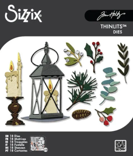 Sizzix Thinlits Stanzschablonen-Set Vault Winter Candlelight von Tim Holtz mit Motiven wie Laterne, Kerzen und Tannenzapfen.