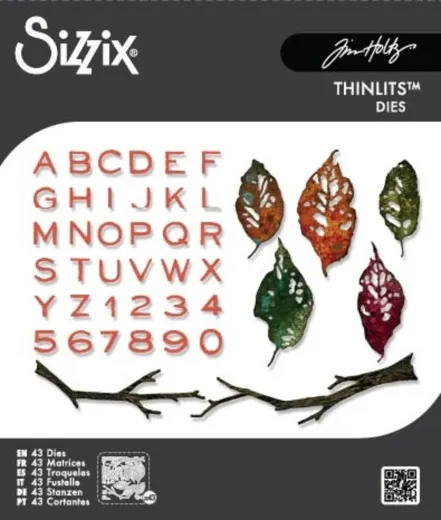 Verpackungsvorderseite mit Alphabet- und Zahlen-Stanzformen sowie kolorierten Herbstblättern und Astzweigen