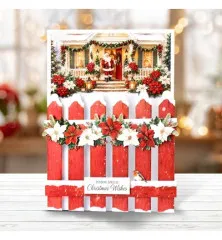 Fertige 3D-Weihnachtskarte mit rotem Gartenzaun und Weihnachtssternen