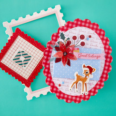 Weihnachtskarte mit Graupapperahmen, Weihnachtsstern-Applikation und Rehkitz-Sticker „Good tidings“
