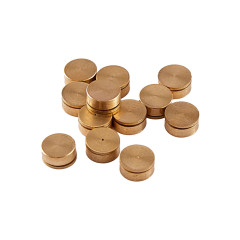 Haufen kleiner runder Messing Card Spinners für interaktive Karten