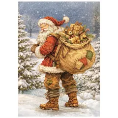 Santa Claus trägt seinen Geschenksack durch den verschneiten Wald.