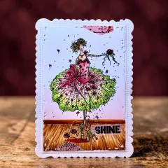 Kolorierte Beispielkarte mit der gestempelten Ballerina im grün-pinkfarbenen Tutu auf Vintage-Papier-Hintergrund und dem Wort „SHINE“.