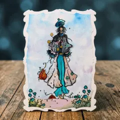 Karte im weißen Wellenrahmen mit Dame in Türkis, Laterne und Blüten im Aquarellstil