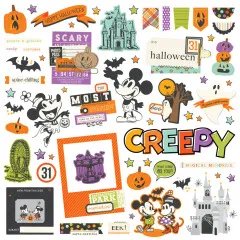 Ausgebreitete Chipboard-Teile: Riesenrad, Schloss, Fotorahmen, Mickey und Minnie sowie Schriftzüge wie „Creepy" und „Most Spookiest"