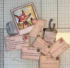 Detailaufnahme: Ausgeschnittene Journal-Seiten mit Fuchs-Illustration, Postkarten-Elementen und Gold-Glitter auf Gitternetz