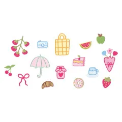 Fertig ausgestanzte und kolorierte Sommerthemenmotive des Sizzix Sets auf weißem Hintergrund