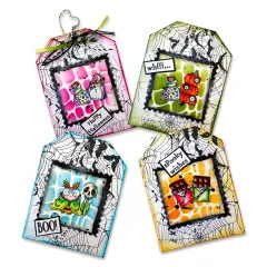4 fertige Bastelarbeiten mit Halloween-Motiven: bedruckte Anhänger in Pink, Grün, Blau und Orange mit Eulenstempeln