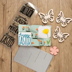Oster-Bastelset mit Stanzschablone, Stempeln und Tulpen-Karte auf Holz