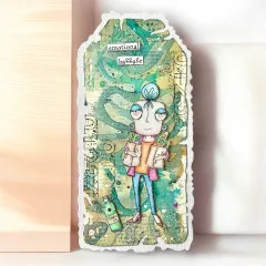 Grüner Beispielanhänger mit Aquarell-Hintergrund, kleiner Ginflasche und Spruch „emotional baggage"