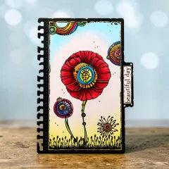 Notizbuch-Beispielkarte mit großer roter Mohnblüte, kleinen Blütenelementen und Stempel „beautiful day"