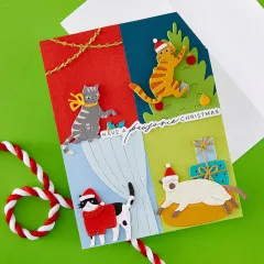 Fertige Weihnachtskarte im Viererraster mit den vier Katzenmotiven und dem Spruch 'Have a Pawsome Christmas'.