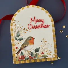 Anwendungsbeispiel: Goldgerahmte Anhängerkarte mit Rotkehlchen-Rub-On und dem Schriftzug 'Merry Christmas'.