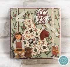 Grußkarte mit Schürzen-Stanzteil, Backutensilien und Schriftzug „Baked With Love“