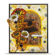 Karte mit gestanztem Bogenrahmen um ein Schreibmaschinen-Foto, umgeben von Mohnblüten, Schmetterlingsanhängern und Wortsticker „vintage"