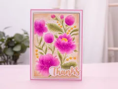Fertige Dankeskarte mit pink kolorierter Pfingstrosen-Prägung und aufgesetztem Thanks-Schriftzug