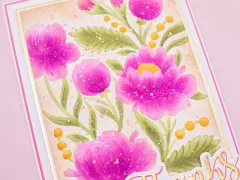 Pink kolorierte Pfingstrosen-Prägung mit Goldflitter und Thanks-Schriftzug in Nahaufnahme