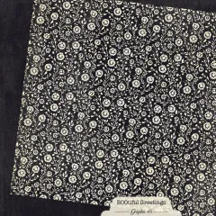 Schwarzes Papier mit elegantem cremefarbenem Blütenmotiv und Blattwerk, doppelseitig