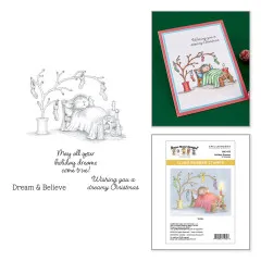 Weihnachtskarte mit koloriertem Motiv von Mudpie und Spruch „Wishing you a dreamy Christmas“ auf grünem Hintergrund