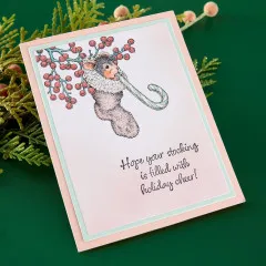 Zwei Weihnachtskarten mit koloriertem Maxwell-Motiv und den Sprüchen „Sweet Holiday Wishes“ und „Unwrap the Magic“