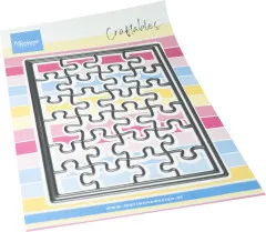 Marianne Design Craftables Stanzschablone Puzzle auf buntem Verpackungspapier