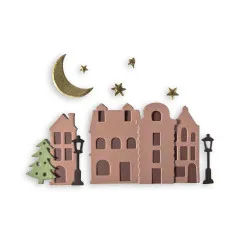 Fertig gestanzte winterliche Häuserzeile mit Laternen, Mond und Sternen aus der Stanzschablone 'Christmas Village'.