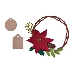 Fertig gestanzter Poinsettia-Kranz mit Tannenzapfen und Anhängern aus der Stanzschablone 'Christmas Wreath'.