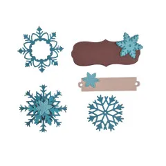 Fertig gestanzte Schneeflocken und Etiketten aus der Stamperia Stanzschablone 'Snowfall'.
