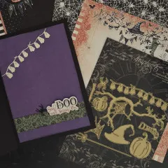 Zwei fertige Halloween-Grußkarten: Violette Karte mit ausgestanztem Geister-Banner und beige-schwarze Karte mit ausgefrästen Geistern, Kürbissen und Spinnennetzen in Gold