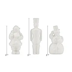 3 weiße Harzfiguren mit Größenangaben: Weihnachtsmann 2¾ Zoll, Spielzeugsoldat 3½ Zoll, Schneemann 2⅛ Zoll