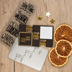 Gebastelte winterliche Triple Step Card mit Rentier-Motiven und getrockneten Orangenscheiben.