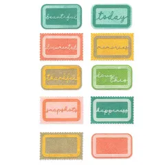 Zehn gestanzte Etiketten mit Briefmarken- und Rundrand, teils mit Schriftzügen wie thankful, love this, snapshots und happiness