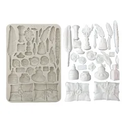 Silikon Gießform im Vergleich: beige Form links, daneben weiße ausgestanzte Motive aus Ton und Clay
