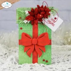 Grüner Kartenhalter mit roter Schleife, rotem Weihnachtsstern und Tag Merry Christmas