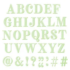 Nahaufnahme des grünen, strukturierten Großbuchstaben-Alphabets samt Satzzeichen.