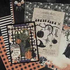 Anwendungsbeispiel: Handgefertigte Halloween-Karten und Scrapbooking-Projekte mit ausgestanzten Geistern, Kürbissen und Spinnennetzmustern in Orange, Schwarz und Violett