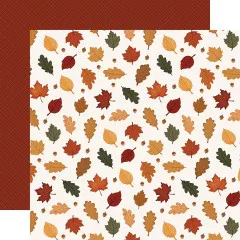 Musterpapier mit bunten Herbstblättern auf cremefarbenem Grund, Rückseite in dunkelrotem Rauten-Steppmuster.