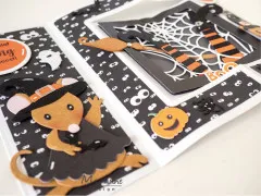 Nahaufnahme der als Hexe verkleideten Maus mit Fledermaus-Applikation