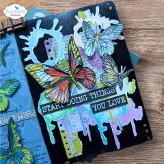 Journalseite mit koloriertem blauem Schmetterling und Foto im Rostrahmen