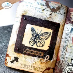 Journalseite mit gerahmtem Schmetterling-Stempel und Etikett "CODE. 31129"