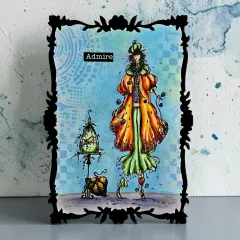 Karte im schwarzen Ornamentrahmen mit Dame in Orange und Grün, Laterne und Admire