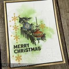 Karte mit Tannenzweig, Christbaumkugeln, goldenen Sternen und Merry Christmas