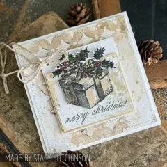 Karte mit Geschenk mit Stechpalme, Kordel und merry christmas