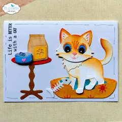 Karte mit Katze, Kratzbaum und Goldfischglas.