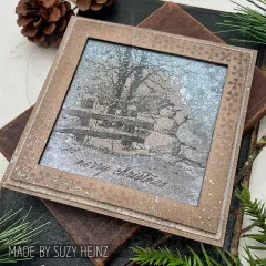 Karte mit Winterszene im Rahmen mit Schneeflocken und Text merry christmas