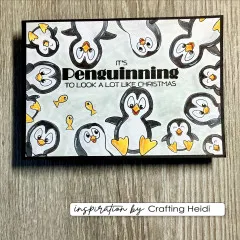Karte mit vielen gestempelten Pinguinen, gelben Fischen und Schriftzug Penguinning