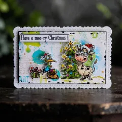 Karte 'Have a moo-ry Christmas!' mit Storch und Kuh vor geschmücktem Weihnachtsbaum
