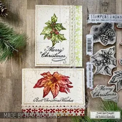 Zwei Karten mit Stechpalme und Weihnachtsstern, daneben die Stempel
