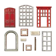 Detailansicht der Karton-Baseboards: rote Doppeltür, weiße mehrteilige Fenster, rote Fensterrahmen, grauer Bogenrahmen, Transparenty-Elemente und Christmas Greetings Schilder